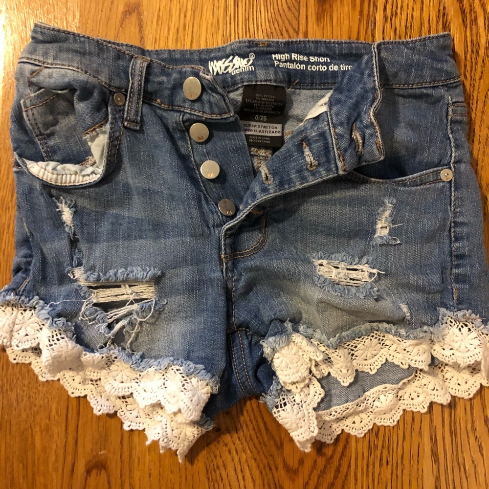 cute  ripped jean shorts with white embroidery!!